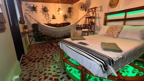 Taganga Apartamento | Cabin with balcony and ocean view.