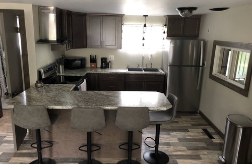Ingalls Casa | Cabin with bar area and pool table-located in Stephenson, MI