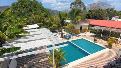 Puerto Carrillo Hotel | Cabinas El Colibri, Apart Hotel