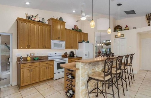 Pine Island Center Casa | Calling Waters-Gulf access w/dock, pool and HT.