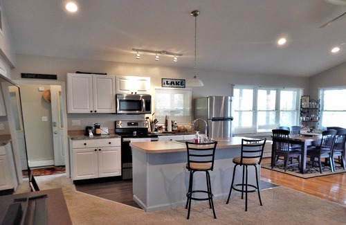 Seneca Falls Casa | Calm on Cayuga. Lakefront home on Cayuga Lake with dock and screened in porch