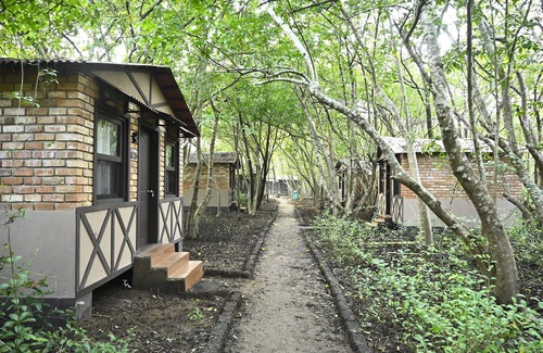 Karwar Cabaña | Camp Riveredge Paradise
