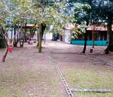 Santinho Hotel | Camping e hospedaria Casarão