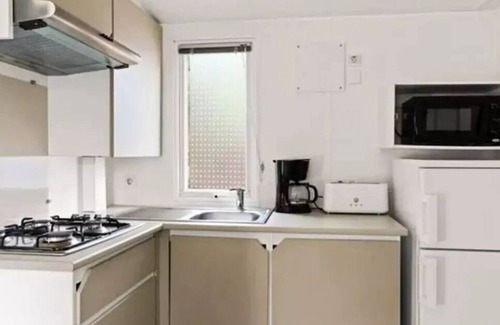 Tregunc Casa | Camping Pommeraie de l'Océan**** - Comfort XL mobile home 3 rooms 4 people TV