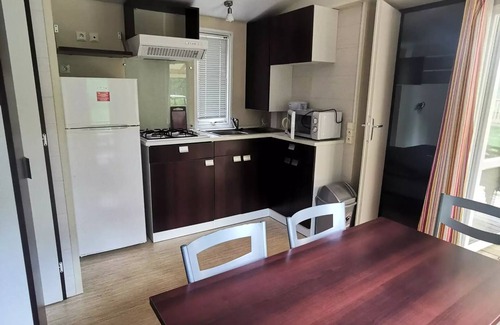 Ucel Casa | Camping Ushuaïa Villages les Pins d'Ucel **** - HIRONDELLE - mobile home 28 m² + TV for 5 to 6 people - 5 people. included in the price