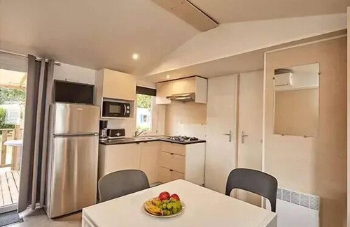 Torreilles-Plage Casa | Campsite Les Dunes***** - Mobile home Comfort 4 rooms 6 people air-conditioned - TV
