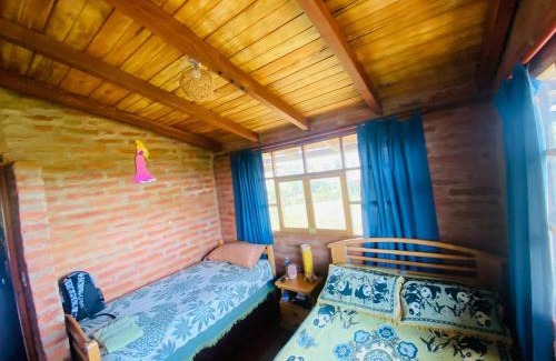 Tulipe Cabina | CAMVUL Farm Lodge - Finca Hotel