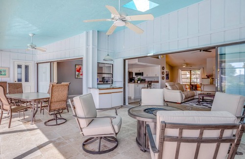 Pebble Beach Casa | Canal-front home with sandy beaches, golf courses, dock, & refreshing pool