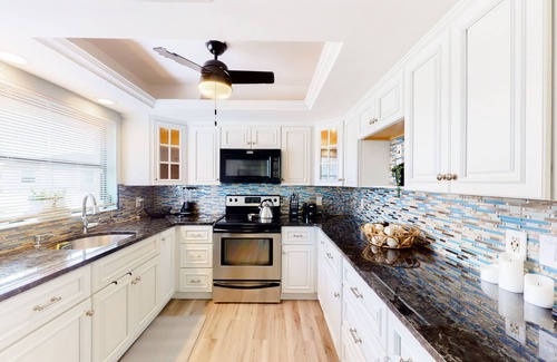 Charlotte Park Casa | Canal-front home with private dock, pool, screened lanai, & W/D