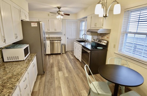 Frisco Casa | Canal Front Home with a Dock and Hot Tub minutes from the beach!