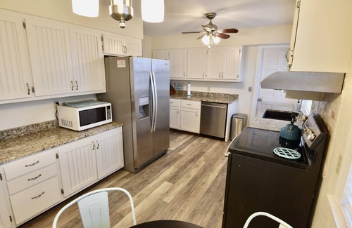 Frisco Casa | Canal Front Home with a Dock and Hot Tub minutes from the beach!