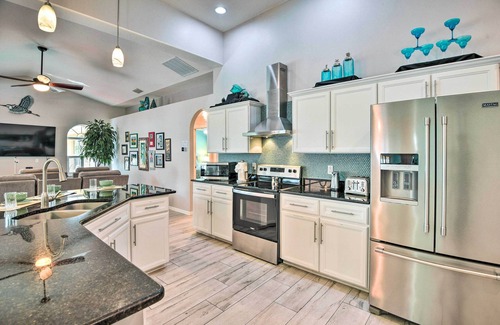 Palm Coast Casa | Canalfront Home w/ Heated Pool & Theater Room!