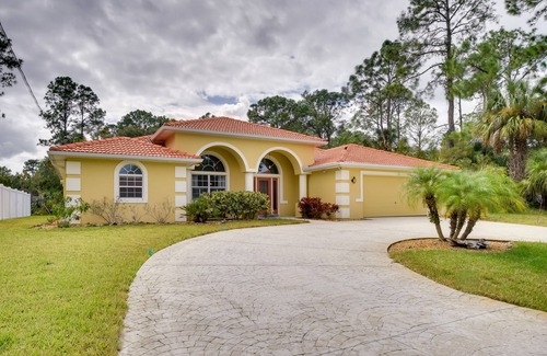 Palm Coast Casa | Canalfront Home w/ Heated Pool & Theater Room!
