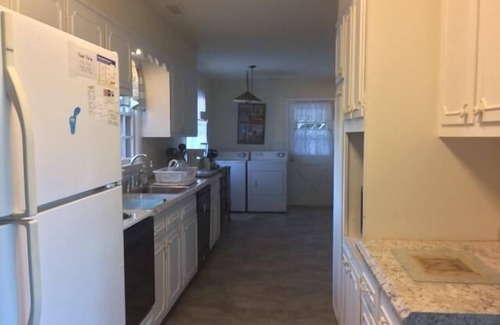 North Shores Casa | Canal-Front Retreat: 5BR Home w/ Private Dock, Porch, Beach & Pool Access!