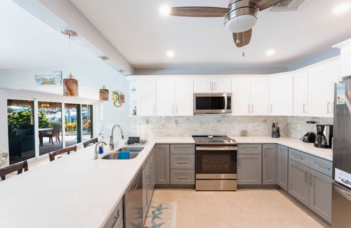 Garden Isles Casa | Canal Oasis W/ Private Dock & Poolside Paradise!