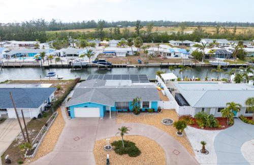 Whitney Beach Casa | Canalfront Bradenton home with Dock & Heated Screened In Pool