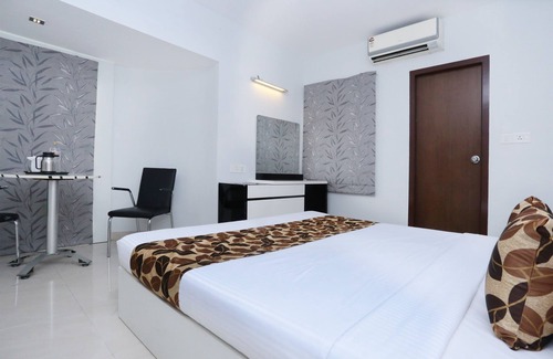 Kochi Hotel | Capital O 10611 Hotel Malabar Illam