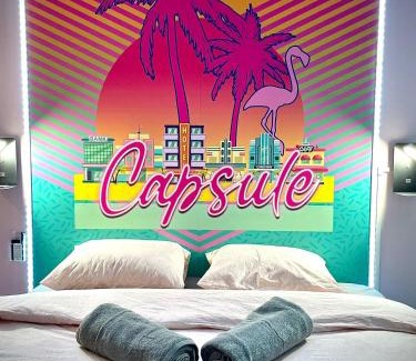 Lievin Apartamento | Capsule Miami Vice - Jacuzzi - Billard - Ecran cinéma & Netflix - Ping-Pong - Nintendo & Jeux-