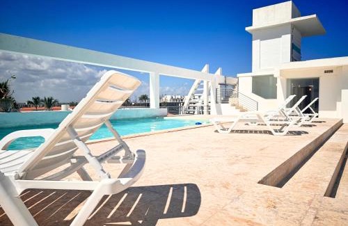 Bavaro Hotel | CARAIBO SUITES Rooftop Pool & Beach Club