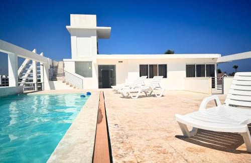 Bavaro Hotel | CARAIBO SUITES Rooftop Pool & Beach Club