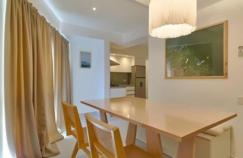 Juan Dolio - El Pueblo Apartamento | Caribbean Golden Sunset View,1BDRM Beachfront Apt.