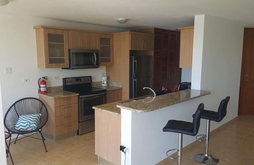 Sardinera Condominio | Condominio caribeño- Marina, piscina y vista al mar! ¡TOTALMENTE REFORMADO A ESTRENAR!
