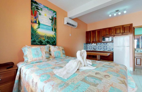 San Pedro Hotel | Caribbean Lily @ Caribe Island