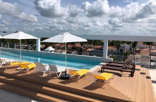Bavaro Apartamento | CARIBBEAN STUDIOS DELUXE with ROOFTOP POOL and SPA - LOS CORALES BEACH