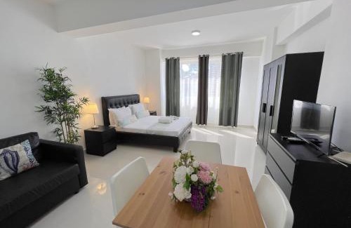 Bavaro Apartamento | CARIBBEAN STUDIOS DELUXE with ROOFTOP POOL and SPA - LOS CORALES BEACH