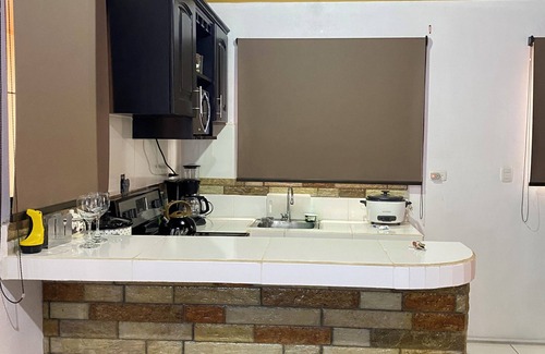 Santa Lucia Apartamento | Caribe Rosa Charming 2-bedroom apartment in wonderful Limon with AC, WiFi