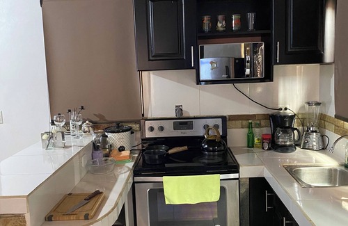 Santa Lucia Apartamento | Caribe Rosa Charming 2-bedroom apartment in wonderful Limon with AC, WiFi