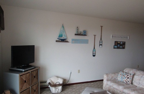 Au Sable Condominio | Carpe Diem 365 located on Lake Huron sandy beach!