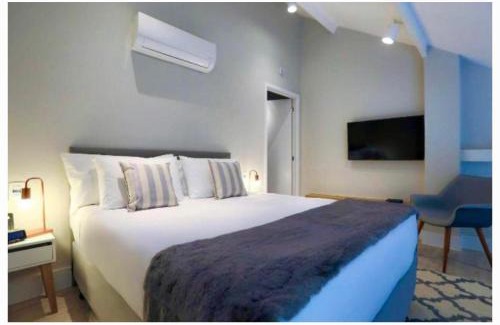 Campos do Jordao Apartamento | Carpe Diem Boutique - Dúplex Hidro e Varanda