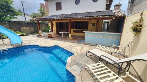 Jardim Virginia Casa | Casa 4 suites A/C Piscina, churrasqueira, Praia da enseada