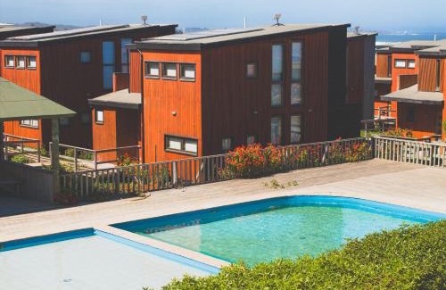 Pichilemu Casa | Casa 46 en condominio Piscina Climatizada