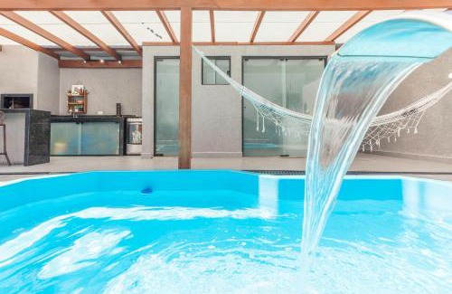 Matinhos Casa | Casa a 700m da Praia com Piscina Aquecida e Churrasqueira