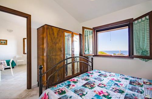 Arbus Casa | Casa Annetta-SUPER VISTA MARE-2 camere - Giardino- Parcheggio - bbq- Wifi free-IUNP5754