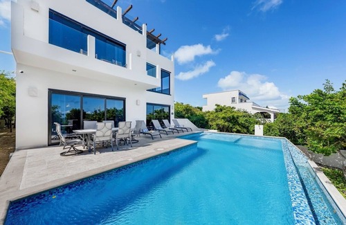 Isla Mujeres Villa | Casa Camacho - 4BR 4. 5BA Modern Caribbean Home en Isla Mujeres
