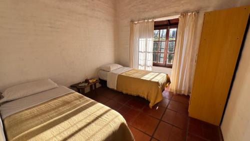 Las Rosas Casa | Casa cercana a plaza de Villa de las Rosas con patio y asador