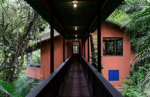 Cidade Jardim Tom Casa | Casa com área gourmet em condomínio perto da praia