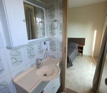 Nova Nazare Casa | Casa com 3 suítes, terraço com churrasqueira e vista para o vale