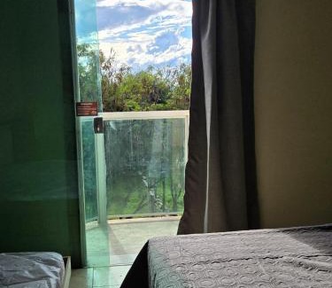 Nova Nazare Casa | Casa com 3 suítes, terraço com churrasqueira e vista para o vale