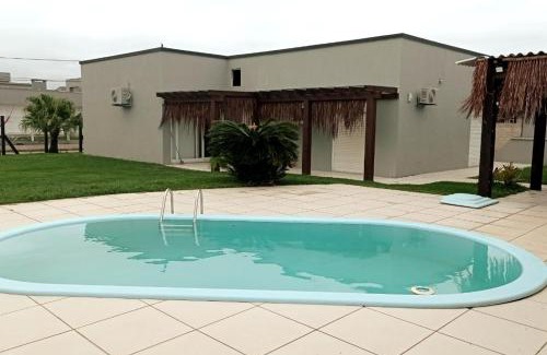 Xangri-La Casa | Casa com 4 dormitórios e piscina em Xangri-lá