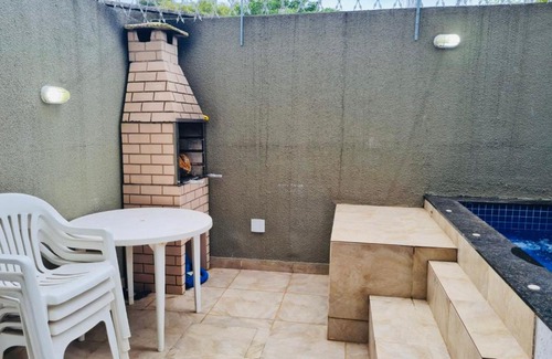 Vista Linda Casa | Casa com jacuzzi dentro de condomínio em Bertioga.