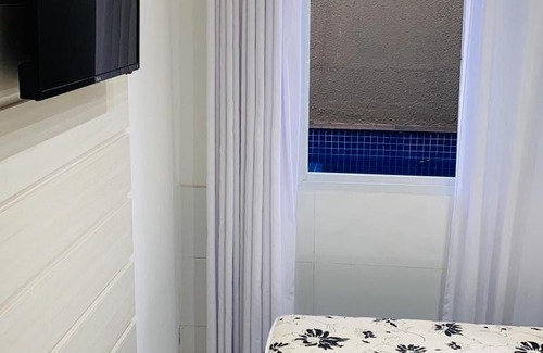 Vista Linda Casa | Casa com jacuzzi dentro de condomínio em Bertioga.