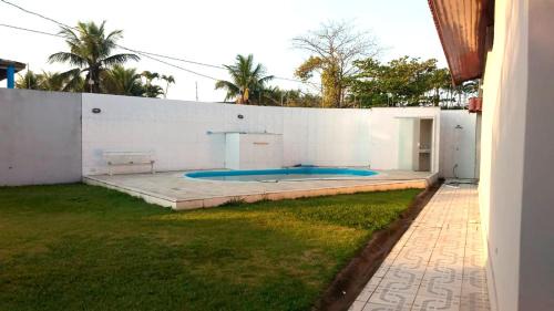 Parque Oasis Casa | Casa com lazer e a 200 m da praia em Peruibe SP