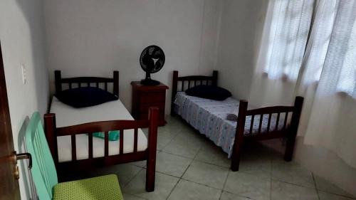 Caiacanga Casa | Casa com linda vista a 500 metros da praia