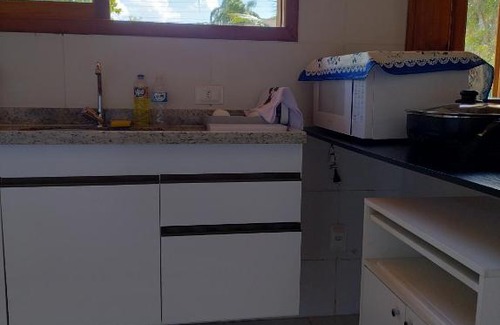 Pereque Casa | Casa com piscina aquecida em condomínio fechado
