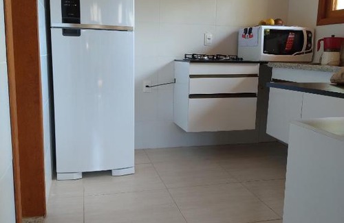 Pereque Casa | Casa com piscina aquecida em condomínio fechado