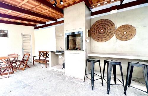 Guaratuba Casa | Casa com piscina , ar condicionado e churrasqueira no balneário Eliana